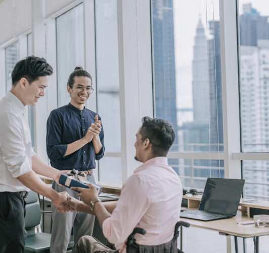 Handing off of a corporate holiday gift